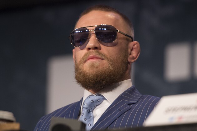 NEW YORK, NY - SEPTEMBER 27:  UFC featherweight champion Conor McGregor of Ireland interacts with the media and fans during the UFC 205 press event at Madison Square Garden on September 27, 2016 in New York City. (Photo by Jeff Bottari/Zuffa LLC/Zuffa LLC via Getty Images)