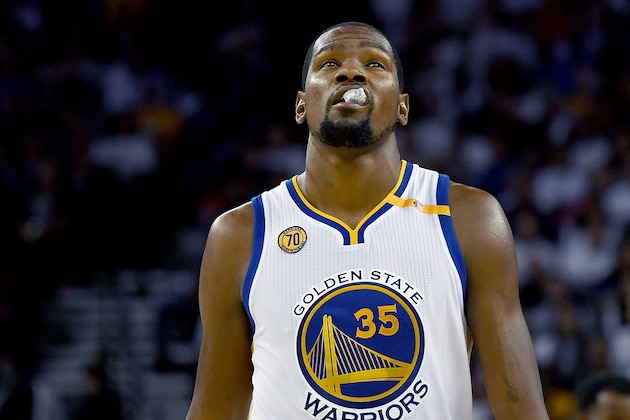 OAKLAND, CA - OCTOBER 25:  Kevin Durant #35 of the Golden State Warriors looks on against the San Antonio Spurs during the third quarter in an NBA basketball game at ORACLE Arena on October 25, 2016 Oakland, California. NOTE TO USER: User expressly acknowledges and agrees that, by downloading and or using this photograph, User is consenting to the terms and conditions of the Getty Images License Agreement.  (Photo by Thearon W. Henderson/Getty Images)
