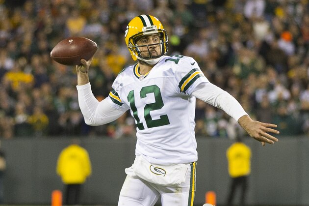 Oct 20, 2016; Green Bay, WI, USA;  Green Bay Packers quarterback Aaron Rodgers (12) looks to throw a pass during the fourth quarter against the Chicago Bears at Lambeau Field.  Green Bay won 26-10.  Mandatory Credit: Jeff Hanisch-USA TODAY Sports