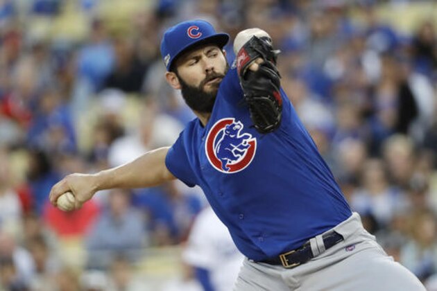 Chicago Cubs' Jake Arrieta throws during the second inning of Game 3 of the National League baseball championship series against the Los Angeles Dodgers Tuesday, Oct. 18, 2016, in Los Angeles. (AP Photo/David J. Phillip)