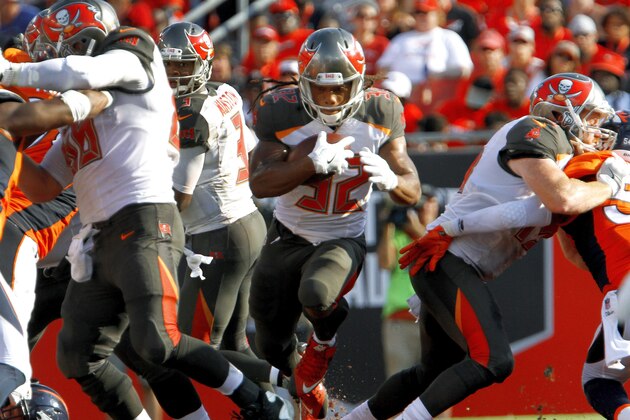 TAMPA, FL - OCTOBER 2:  Jacquizz Rodgers #32 of the Tampa Bay Buccaneers finds a lane in which  to run in the first quarter of a game against the Denver Broncos at Raymond James Stadium on October 2, 2016 in Tampa, Florida. (Photo by Joseph Garnett Jr. /Getty Images)
