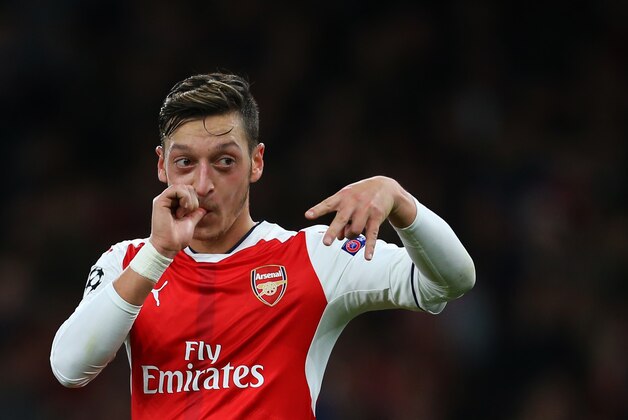 LONDON, ENGLAND - OCTOBER 19: Mesut Ozil of Arsenal celebrates after scoring during the UEFA Champions League match between Arsenal FC and PFC Ludogorets Razgrad at Emirates Stadium on October 19, 2016 in London, England. (Photo by Catherine Ivill - AMA/Getty Images)