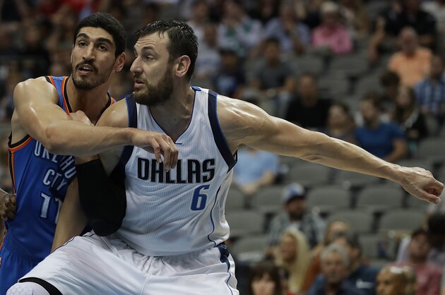 DALLAS, TX - OCTOBER 11:  Enes Kanter #11 of the Oklahoma City Thunder and Andrew Bogut #6 of the Dallas Mavericks battle during a preseason game at American Airlines Center on October 11, 2016 in Dallas, Texas.  (Photo by Ronald Martinez/Getty Images)