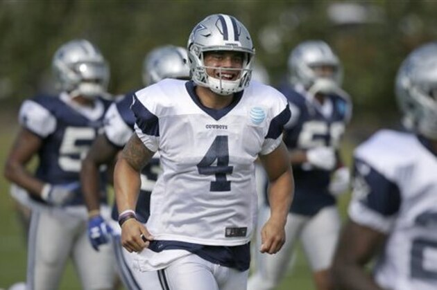 Dallas Cowboys quarterback Dak Prescott (4) runs the field during football practice at the team's facility in Frisco, Texas, Wednesday, Oct. 26, 2016. (AP Photo/LM Otero)