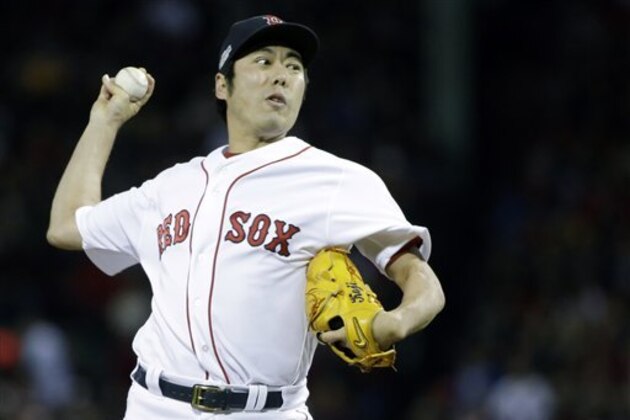 Boston Red Sox relief pitcher Koji Uehara delivers against the Cleveland Indians during the eighth inning in Game 3 of baseball's American League Division Series, Monday, Oct. 10, 2016, in Boston. (AP Photo/Elise Amendola)