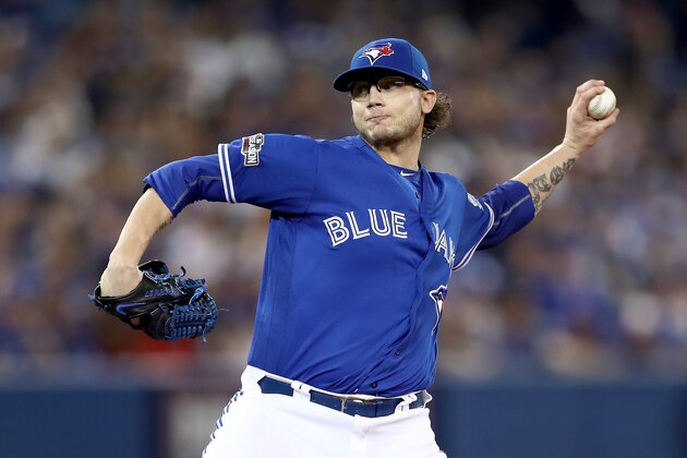TORONTO, ON - OCTOBER 18:  Brett Cecil #27 of the Toronto Blue Jays throws a pitch in the seventh inning against the Cleveland Indians during game four of the American League Championship Series at Rogers Centre on October 18, 2016 in Toronto, Canada.  (Photo by Elsa/Getty Images)