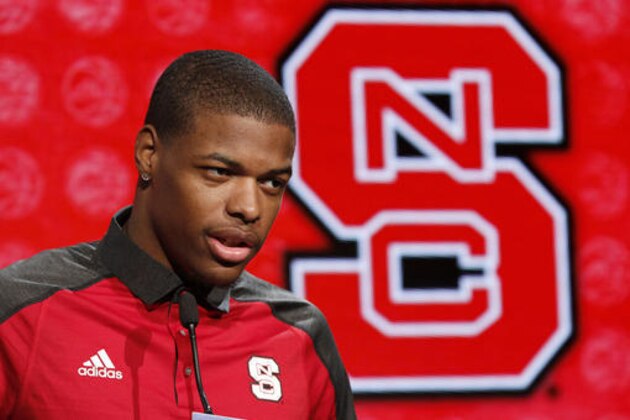 North Carolina State NCAA college basketball player Dennis Smith, Jr. answers a question during the Atlantic Coast Conference media day in Charlotte, N.C., Wednesday, Oct., 26, 2016. (AP Photo/Bob Leverone)