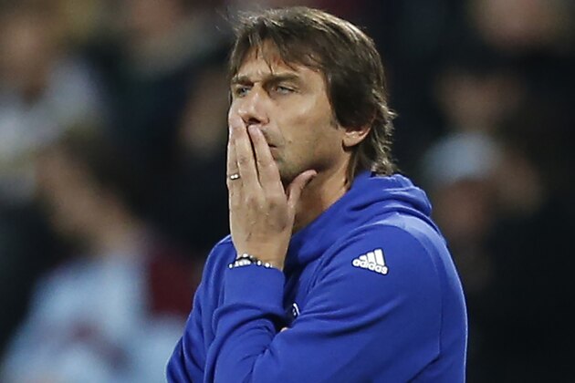 Chelsea's Italian head coach Antonio Conte gestures on the touchline during the EFL (English Football League) Cup fourth round match between West Ham United and Chelsea at The London Stadium in east London on October 26, 2016. / AFP / Ian KINGTON / RESTRICTED TO EDITORIAL USE. No use with unauthorized audio, video, data, fixture lists, club/league logos or 'live' services. Online in-match use limited to 75 images, no video emulation. No use in betting, games or single club/league/player publications.  /         (Photo credit should read IAN KINGTON/AFP/Getty Images)