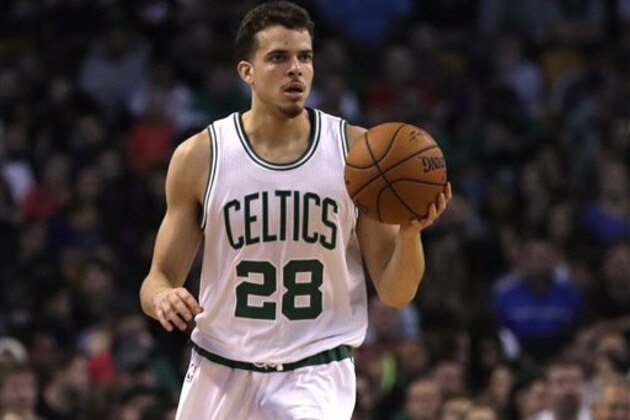 Boston Celtics guard R.J. Hunter (28) brings the ball up court during the second half of a preseason NBA basketball game in Boston, Monday, Oct. 17, 2016. The Celtics defeated the Nets 120-99. (AP Photo/Charles Krupa)