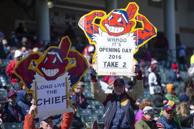 CLEVELAND, OH -  APRIL 5:  Cleveland Indians fans hold up Chief Wahoo signs prior to the game against the Boston Red Sox the opening day game at Progressive Field on April 5, 2016 in Cleveland, Ohio. (Photo by Jason Miller/Getty Images)