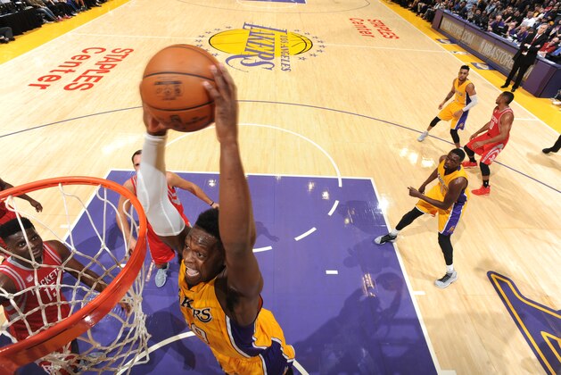 LOS ANGELES, CA - OCTOBER 26: Julius Randle #30 of the Los Angeles Lakers dunks against the Houston Rockets on October 26, 2016 at STAPLES Center in Los Angeles, California. NOTE TO USER: User expressly acknowledges and agrees that, by downloading and/or using this Photograph, user is consenting to the terms and conditions of the Getty Images License Agreement. Mandatory Copyright Notice: Copyright 2016 NBAE (Photo by Andrew D. Bernstein/NBAE via Getty Images)
