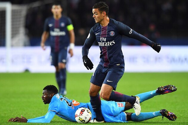 Paris Saint-Germain's French forward Hatem Ben Arfa (R) vies with Olympique de Marseille's French midfielder Andre-Frank Zambo Anguissa during the French L1 football match between Paris Saint-Germain and Olympique of Marseille at the Parc des Princes stadium in Paris on October 23, 2016.  / AFP / FRANCK FIFE        (Photo credit should read FRANCK FIFE/AFP/Getty Images)