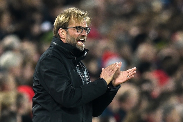 Liverpool's German manager Jurgen Klopp gestures on the touchline during the EFL (English Football League) Cup fourth round match between Liverpool and Tottenham Hotspur at Anfield in Liverpool north west England on October 25, 2016. / AFP / Oli SCARFF / RESTRICTED TO EDITORIAL USE. No use with unauthorized audio, video, data, fixture lists, club/league logos or 'live' services. Online in-match use limited to 75 images, no video emulation. No use in betting, games or single club/league/player publications.  /         (Photo credit should read OLI SCARFF/AFP/Getty Images)