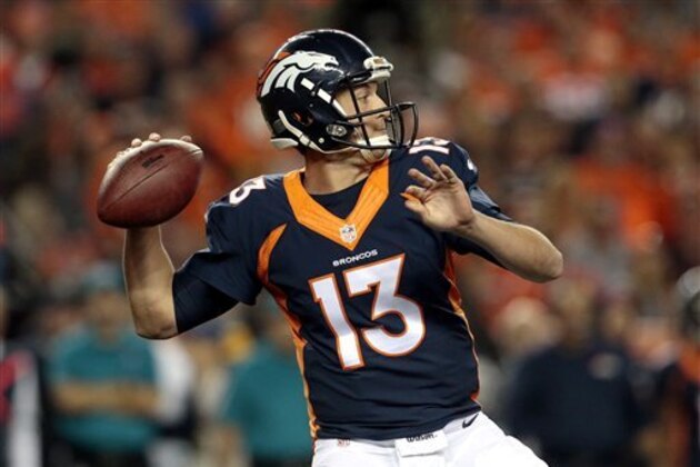 Denver Broncos quarterback Trevor Siemian (13) throws against the Houston Texans during the first half of an NFL football game, Monday, Oct. 24, 2016, in Denver. (AP Photo/Joe Mahoney)