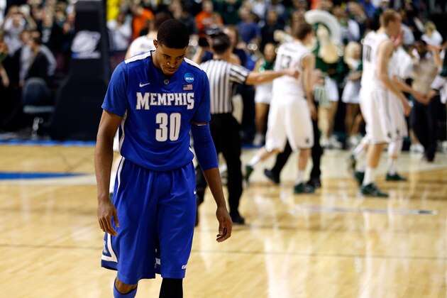 AUBURN HILLS, MI - MARCH 23:  D.J. Stephens #30 of the Memphis Tigers walks off of the court dejected after they lost 70-48 against the Michigan State Spartans during the third round of the 2013 NCAA Men's Basketball Tournament at The Palace of Auburn Hills on March 23, 2013 in Auburn Hills, Michigan.  (Photo by Gregory Shamus/Getty Images)