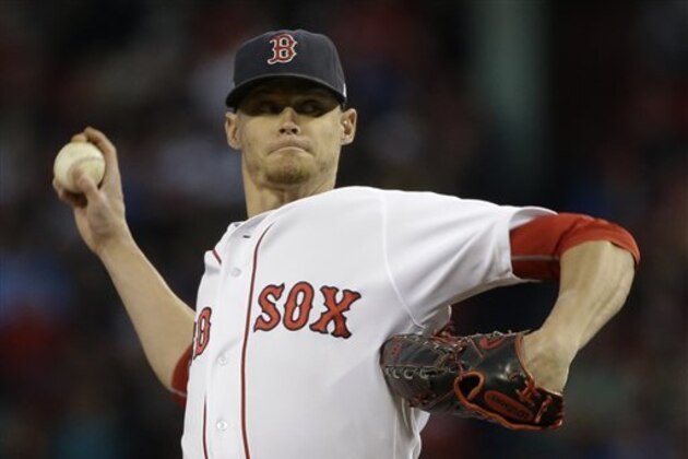 Boston Red Sox starting pitcher Clay Buchholz delivers against the Cleveland Indians during the first inning in Game 3 of baseball's American League Division Series, Monday, Oct. 10, 2016, in Boston. (AP Photo/Elise Amendola)