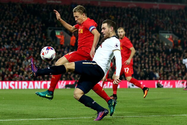 LIVERPOOL, ENGLAND - OCTOBER 25:  Vincent Janssen of Tottenham Hotspur (R) tackles Lucas Leiva of Liverpool (L) during the EFL Cup fourth round match between Liverpool and Tottenham Hotspur at Anfield on October 25, 2016 in Liverpool, England.  (Photo by Jan Kruger/Getty Images)