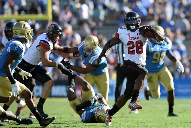 October 22, 2016; Pasadena, CA, USA; Utah Utes running back Joe Williams (28) runs the ball against the UCLA Bruins during the second half at the Rose Bowl. Mandatory Credit: Gary A. Vasquez-USA TODAY Sports
