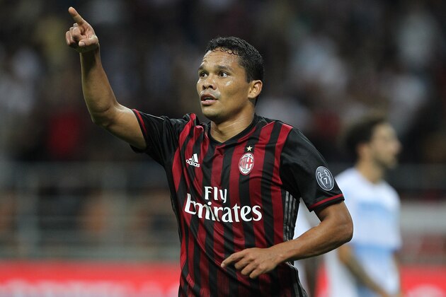 MILAN, ITALY - SEPTEMBER 20:  Carlos Bacca of AC Milan celebrates after scoring the opening goal during the Serie A match between AC Milan and SS Lazio at Stadio Giuseppe Meazza on September 20, 2016 in Milan, Italy.  (Photo by Marco Luzzani/Getty Images)