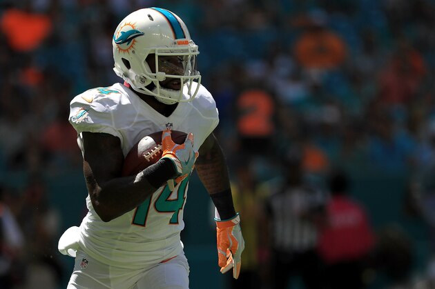 MIAMI GARDENS, FL - OCTOBER 09:  Jarvis Landry #14 of the Miami Dolphins rushes during a game against the Tennessee Titans on October 9, 2016 in Miami Gardens, Florida.  (Photo by Mike Ehrmann/Getty Images)