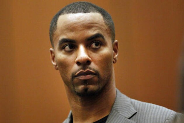FILE - In this Feb. 20, 2014, file photo, former NFL safety Darren Sharper appears in Los Angeles Superior Court in Los Angeles. The two Louisiana co-defendants in the drug and rape case that brought down one-time NFL star Sharper are set for sentencing in federal court in New Orleans. Erik Nunez, a former restaurant worker, and Brandon Licciardi a former suburban sheriff's deputy, pleaded guilty to state and federal charges earlier this year. Formal sentencing is set for Thursday morning, Oct. 20, 2016. (Bob Chamberlin/Los Angeles Times via AP, Pool, File)