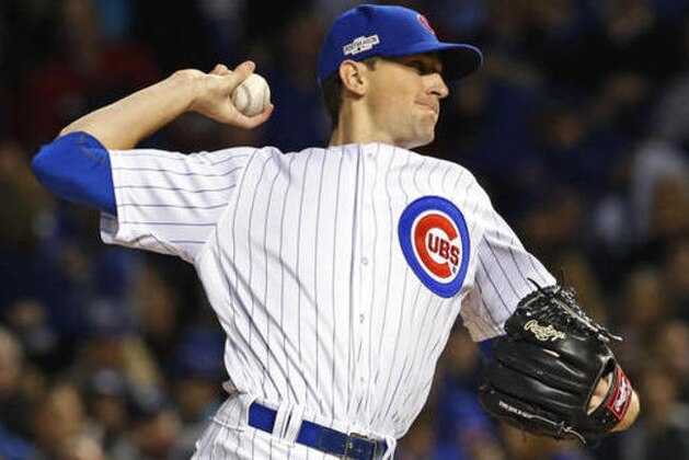 Chicago Cubs starting pitcher Kyle Hendricks (28) throws during the first inning of Game 6 of the National League baseball championship series against the Los Angeles Dodgers Saturday, Oct. 22, 2016, in Chicago. (AP Photo/Nam Y. Huh)