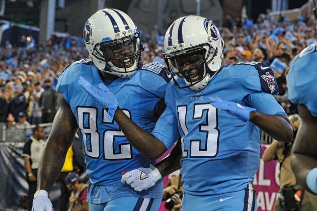 NASHVILLE, TN - OCTOBER 27:  Delanie Walker #82 of the Tennessee Titans congratulates teammate Kendall Wright #13 on scoring a touchdown against the Jacksonville Jaguars during the first half at Nissan Stadium on October 27, 2016 in Nashville, Tennessee.  (Photo by Frederick Breedon/Getty Images)