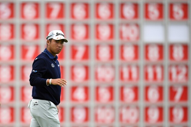 Hideki Matsuyama of Japan reacts in front of the leaderboard after he finishes the 18th hole during the second round of the World Golf Championships-HSBC Champions golf tournament in Shanghai on October 28, 2016. / AFP / JOHANNES EISELE        (Photo credit should read JOHANNES EISELE/AFP/Getty Images)