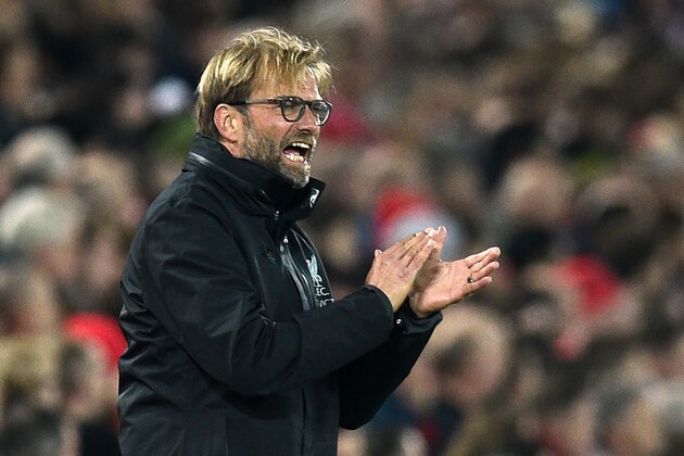 Liverpool's German manager Jurgen Klopp gestures on the touchline during the EFL (English Football League) Cup fourth round match between Liverpool and Tottenham Hotspur at Anfield in Liverpool north west England on October 25, 2016. / AFP / Oli SCARFF / RESTRICTED TO EDITORIAL USE. No use with unauthorized audio, video, data, fixture lists, club/league logos or 'live' services. Online in-match use limited to 75 images, no video emulation. No use in betting, games or single club/league/player publications.  /         (Photo credit should read OLI SCARFF/AFP/Getty Images)