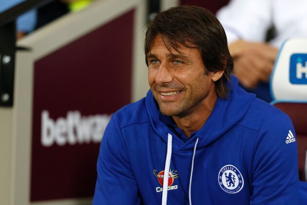 Chelsea's Italian head coach Antonio Conte looks on ahead of the EFL (English Football League) Cup fourth round match between West Ham United and Chelsea at The London Stadium in east London on October 26, 2016. / AFP / Ian KINGTON / RESTRICTED TO EDITORIAL USE. No use with unauthorized audio, video, data, fixture lists, club/league logos or 'live' services. Online in-match use limited to 75 images, no video emulation. No use in betting, games or single club/league/player publications.  /         (Photo credit should read IAN KINGTON/AFP/Getty Images)