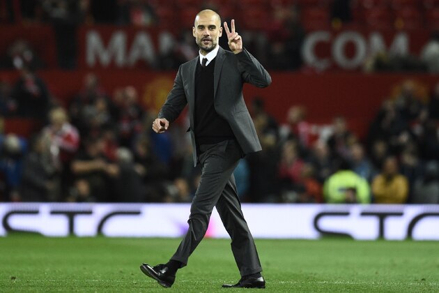 Manchester City's Spanish manager Pep Guardiola gestures on the pitch after the EFL (English Football League) Cup fourth round match between Manchester United and Manchester City at Old Trafford in Manchester, north west England on October 26, 2016.
Manchester United won the game 1-0. / AFP / Oli SCARFF / RESTRICTED TO EDITORIAL USE. No use with unauthorized audio, video, data, fixture lists, club/league logos or 'live' services. Online in-match use limited to 75 images, no video emulation. No use in betting, games or single club/league/player publications.  /         (Photo credit should read OLI SCARFF/AFP/Getty Images)