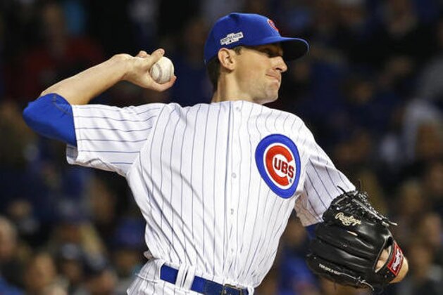 Chicago Cubs starting pitcher Kyle Hendricks (28) throws during the first inning of Game 6 of the National League baseball championship series against the Los Angeles Dodgers Saturday, Oct. 22, 2016, in Chicago. (AP Photo/Nam Y. Huh)