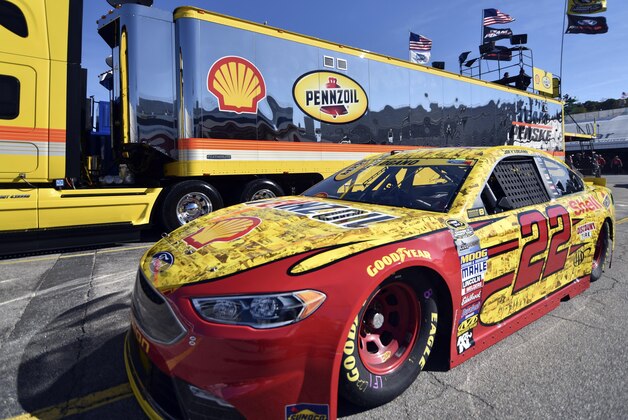 Oct 28, 2016; Martinsville, VA, USA; Sprint Cup Series driver Joey Logano (22) drives past his team's hauler during practice for the Goody's Fast Relief 500 at Martinsville Speedway. Mandatory Credit: Michael Shroyer-USA TODAY Sports Oct 28, 2016; Martinsville, VA, USA; Sprint Cup Series driver Joey Logano (22) drives past his team's hauler during practice for the Goody's Fast Relief 500 at Martinsville Speedway. Mandatory Credit: Michael Shroyer-USA TODAY Sports