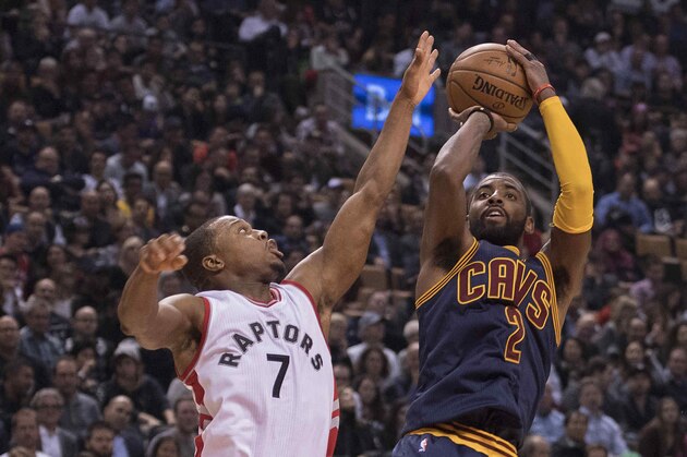 Oct 28, 2016; Toronto, Ontario, CAN; Cleveland Cavaliers guard Kyrie Irving (2) shoots a ball as Toronto Raptors guard Kyle Lowry (7) defends during the second quarter in a game at Air Canada Centre. Mandatory Credit: Nick Turchiaro-USA TODAY Sports