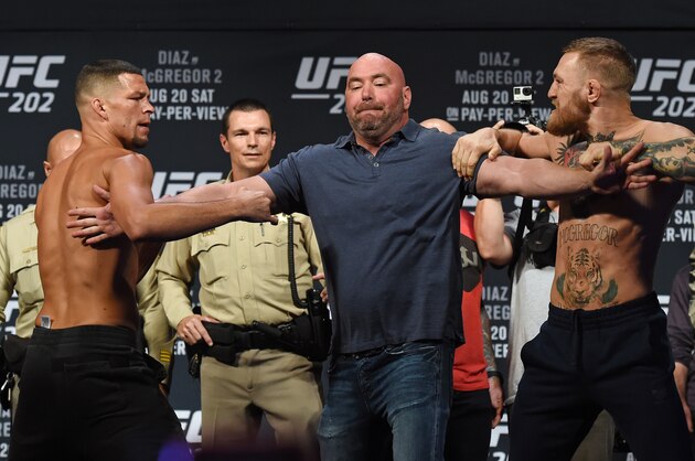 LAS VEGAS, NV - AUGUST 19:  UFC President Dana White (C) separates mixed martial artist Nate Diaz (L) and UFC featherweight champion Conor McGregor (R) as they face off during their weigh-in for UFC 202 at MGM Grand Conference Center on August 19, 2016 in Las Vegas, Nevada. The fighters will meet in a welterweight rematch on August 20, 2016, at T-Mobile Arena in Las Vegas.  (Photo by Ethan Miller/Getty Images)