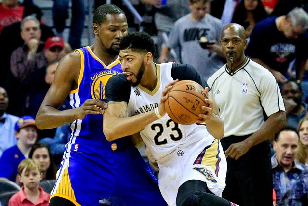 Oct 28, 2016; New Orleans, LA, USA;  New Orleans Pelicans forward Anthony Davis (23) drives past Golden State Warriors forward Kevin Durant (35) during the first quarter of a game at the Smoothie King Center. Mandatory Credit: Derick E. Hingle-USA TODAY Sports