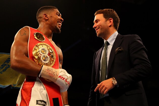 LONDON, ENGLAND - JUNE 25:  Anthony Joshua of Great Britain celebrates with promoter Eddie Hearn after defeating Dominic Breazeale of The USA during their IBF World Heavyweight Championship bout at The O2 Arena on June 25, 2016 in London, England.  (Photo by Richard Heathcote/Getty Images)