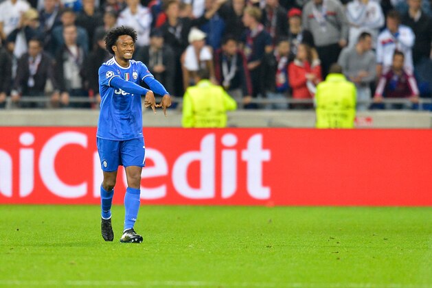 LYON, FRANCE - OCTOBER 18:  Juan Cuadrado of Juventus reacts after scoring during the UEFA Champions League match between Olympique Lyonnais and Juventus at Parc Lyonnais on October 18, 2016 in Lyon .  (Photo by Aurelien Meunier/Getty Images)