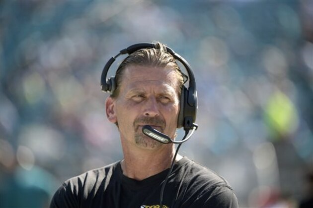 Jacksonville Jaguars offensive coordinator Greg Olson watches from the sideline during player introductions prior to an NFL football game against the Miami Dolphins in Jacksonville, Fla., Sunday, Sept. 20, 2015. (AP Photo/Phelan M. Ebenhack)