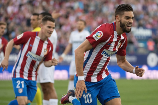 Atletico Madrid's Belgian midfielder Yannick Ferreira Carrasco celebrates a goal during the Spanish league football match between Club Atletico de Madrid and Malaga CF at the Vicente Calderon stadium in Madrid on October 29, 2016. / AFP / CURTO DE LA TORRE        (Photo credit should read CURTO DE LA TORRE/AFP/Getty Images)