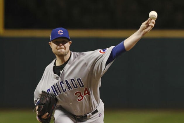 Chicago Cubs starting pitcher Jon Lester throws during the first inning of Game 1 of the Major League Baseball World Series against the Cleveland Indians Tuesday, Oct. 25, 2016, in Cleveland. (AP Photo/Elsa Garrison)