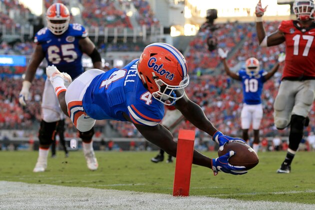 JACKSONVILLE, FL - OCTOBER 29: Brandon Powell #4 of the Florida Gators dives for the pylon after stepping out of bounds during the second half of the game against the Georgia Bulldogs at EverBank Field on October 29, 2016 in Jacksonville, Florida. (Photo by Rob Foldy/Getty Images)