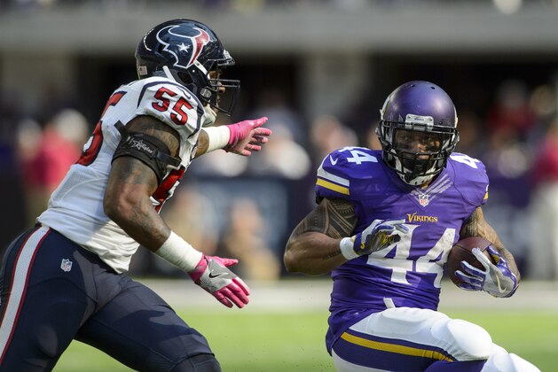 MINNEAPOLIS, MN - OCTOBER 9: Matt Asiata #44 of the Minnesota Vikings carries the ball against Benardrick McKinney #55 of the Houston Texans during the game on October 9, 2016 at US Bank Stadium in Minneapolis, Minnesota. The Vikings defeated the Texans 31-13. (Photo by Hannah Foslien/Getty Images)