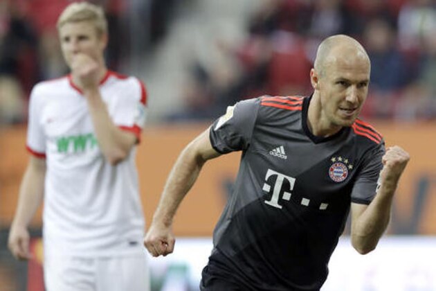 Bayern's Arjen Robben celebrates after scoring his side's second goal during the German Bundesliga soccer match between FC Augsburg and FC Bayern Munich in Augsburg, Germany, Saturday, Oct. 29, 2016. (AP Photo/Matthias Schrader)