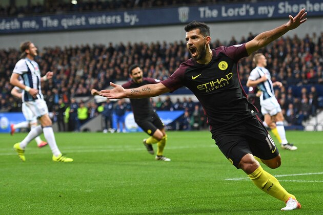 Manchester City's Argentinian striker Sergio Aguero celebrates after scoring the opening goal of the English Premier League football match between West Bromwich Albion and Manchester City at The Hawthorns stadium in West Bromwich, central England, on October 29, 2016.
 / AFP / Justin TALLIS / RESTRICTED TO EDITORIAL USE. No use with unauthorized audio, video, data, fixture lists, club/league logos or 'live' services. Online in-match use limited to 75 images, no video emulation. No use in betting, games or single club/league/player publications.  /         (Photo credit should read JUSTIN TALLIS/AFP/Getty Images)