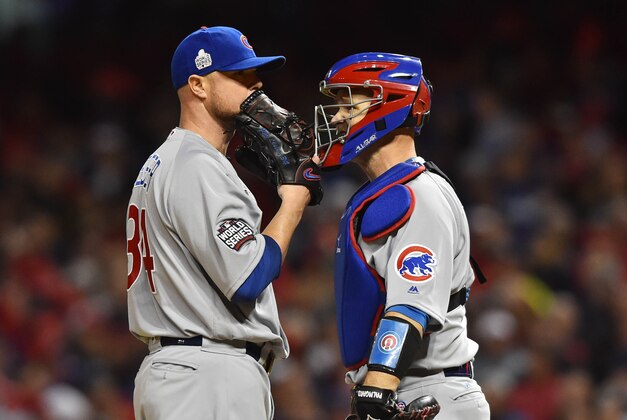 Oct 25, 2016; Cleveland, OH, USA; Chicago Cubs starting pitcher Jon Lester (34) talks with catcher David Ross (3) in the first inning against the Cleveland Indians in game one of the 2016 World Series at Progressive Field. Mandatory Credit: Ken Blaze-USA TODAY Sports