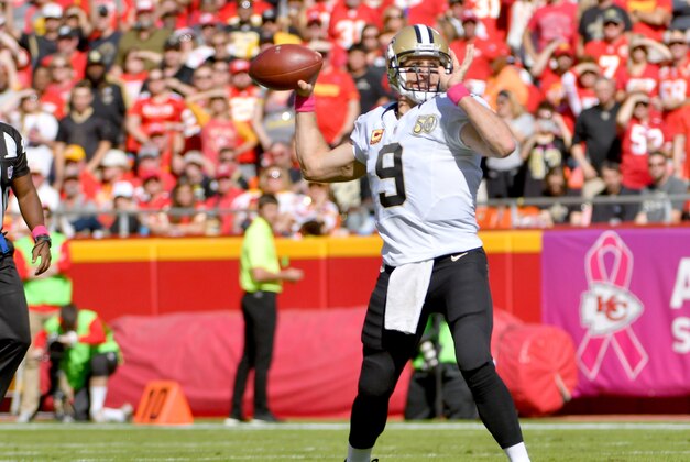 Oct 23, 2016; Kansas City, MO, USA;  New Orleans Saints quarterback Drew Brees (9) throws a pass during the first half against the Kansas City Chiefs at Arrowhead Stadium. Mandatory Credit: Denny Medley-USA TODAY Sports