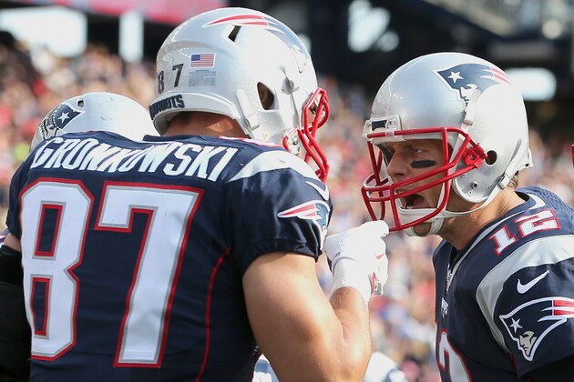 FOXBORO, MA - OCTOBER 16:  Rob Gronkowski #87 and Tom Brady #12 of the New England Patriots celebrate after scoring a touchdown against the Cincinnati Bengals in the third quater at Gillette Stadium on October 16, 2016 in Foxboro, Massachusetts.  (Photo by Jim Rogash/Getty Images)