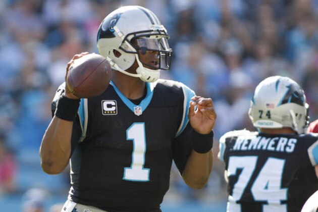 Carolina Panthers' Cam Newton (1) looks to pass against the Arizona Cardinals in the second half of an NFL football game in Charlotte, N.C., Sunday, Oct. 30, 2016. (AP Photo/Bob Leverone)