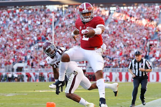TUSCALOOSA, AL - OCTOBER 22:  Jalen Hurts #2 of the Alabama Crimson Tide is pushed out of bounds during this rush against Armani Watts #23 of the Texas A&M Aggies at Bryant-Denny Stadium on October 22, 2016 in Tuscaloosa, Alabama.  (Photo by Kevin C. Cox/Getty Images)